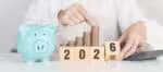 2025 end year to Happy New Year 2026 with piggy bank. Resolution, Goals, Plan, Action, Money Saving, Retirement fund, Pension, Investment and Financial concepts